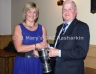 Geraldine Doherty presents the Dan Doherty Memorial Cup for Club Person of the year to John McAuley